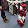 Hitachi has revamped its Emiew 2 humanoid robot, designed to be an office helper, so that it can track the movements of people in crowded areas and avoid collisions. 