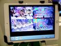 At a demo held May 26, 2015, at NHK Science & Technology Laboratories in Tokyo, a Hybridcast tablet allows users to choose their preferred camera angle from a pop band concert. 