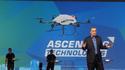 Intel CEO Brian Krzanich with drones floating around during CES 2015 keynote