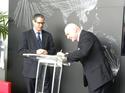 Signing the inauguration document (Senator Stephan Conroy and Equinix Australia managing director Tony Simonsen).