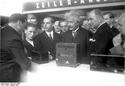 Albert Einstein inspects radios at the Berlin funkausstellung in 1930