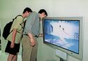 Flat screen TVs draw the curious at IFA 2001