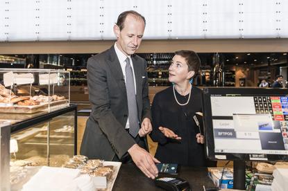 ANZ CEO Shayne Elliott and ANZ GM deposits & payments Katherine Bray using Android Pay.