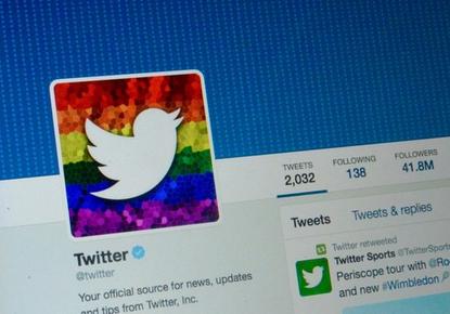 Twitter's logo on a rainbow background, pictured June 26, 2015, after the U.S. Supreme Court's same-sex marriage ruling.