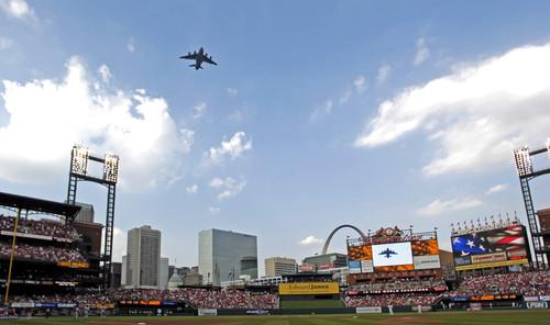 A C-17 Globemaster III flies over Busch Stadium in St. Louis before the Cardinals-Giants baseball game July 7, 2007. The flyover was part of Air Force Week St Louis.