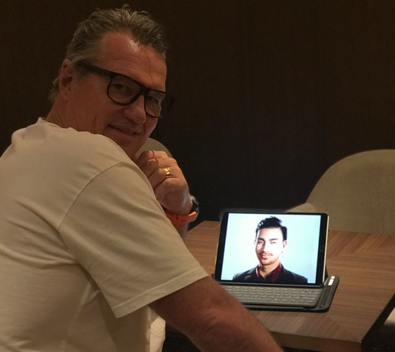 NZ rugby great and mental health activist John Kirwan talks to FaceMe digital human 'Spencer' – a prototype digital mental health coach.