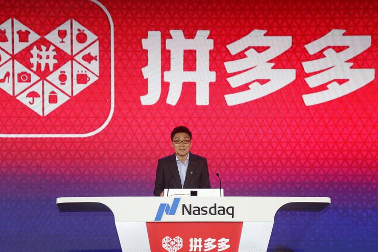 Colin Huang, founder and CEO of the online group discounter Pinduoduo, speaks during the company's stock trading debut at the Nasdaq Stock Market in New York, during an event in Shanghai, China July 26, 2018. Yin Liqin/CNS via REUTERS