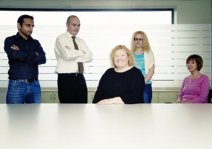 “IT may use technology to drive outcomes, but it takes people and a team to really do that,” says healthAlliance CIO Claire Govier, with some members of her team. From left: Ashok Kalyanji, project manager; John La Hood, project manager; Claire Webb, project coordinator; and Diane Wood, project manager