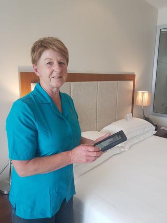 Sharon Preston, executive housekeeper, has replaced her paper and clipboard with a mobile device that provides real-time operational data 